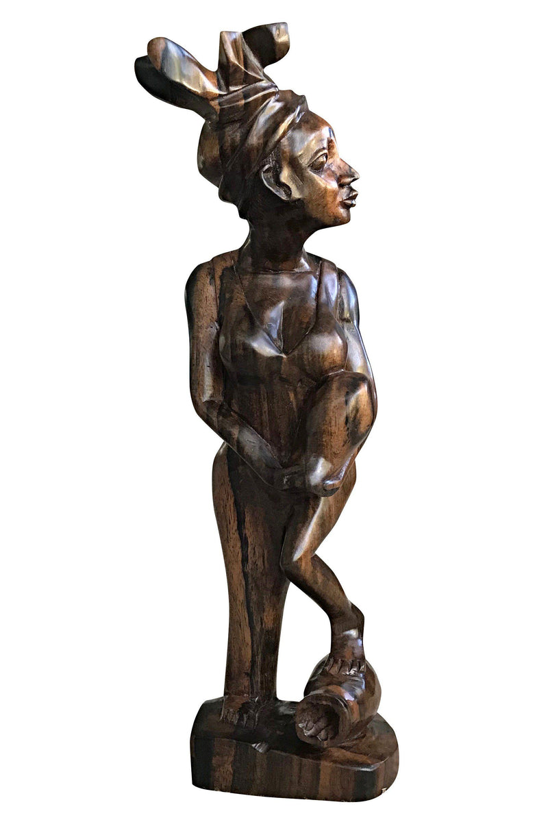 Ebony Hand Carving African Figurines statues / Woman wearing headwrap, holding an empty jar and a foot on another jar - Afrilege