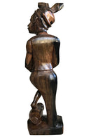 Ebony Hand Carving African Figurines statues / Woman wearing headwrap, holding an empty jar and a foot on another jar - Afrilege
