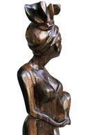 Ebony Hand Carving African Figurines statues / Woman wearing headwrap, holding an empty jar and a foot on another jar - Afrilege