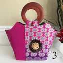 Ebele Hand Woven Raffia Fibers African Print Basket Bag with wood handle - purple / Pink - Afrilege