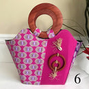 Ebele Hand Woven Raffia Fibers African Print Basket Bag with wood handle - purple / Pink - Afrilege