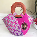 Ebele Hand Woven Raffia Fibers Basket African Bag with wood handle - pink - Afrilege