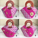 Ebele Hand Woven Raffia Fibers Basket African Bag with wood handle - pink - Afrilege