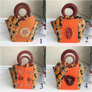 Masika African Hand Woven Raffia Fibers African print basket bag - Orange - Afrilege