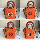 Masika African Hand Woven Raffia Fibers African print basket bag - Orange - Afrilege