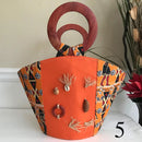 Masika Hand Woven Raffia Fibers African Basket bag with wood handle - Big - Afrilege