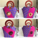 Nina Hand Woven Raffia Fibers African Print Basket Bag with wood handle - purple / Pink - Afrilege