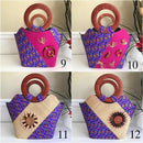 Nina Hand Woven Raffia Fibers African Print Basket Bag with wood handle - purple / Pink - Afrilege