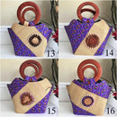 Nina Hand Woven Raffia Fibers African Print Basket Bag with wood handle - purple / Pink - Afrilege